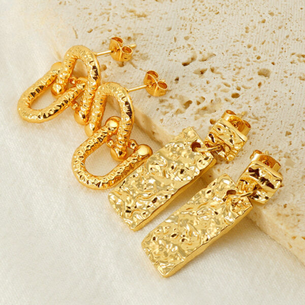 0de2ab7d7abade2295b5cdee3bc1041b Wholesale Stainless Steel Geometric Interlocking Gold Plated Earrings