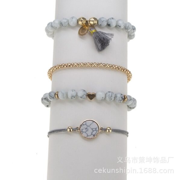 Wholesale Pine Stone Tassel Round Stone Bracelet