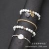 Wholesale Pine Stone Tassel Round Stone Bracelet