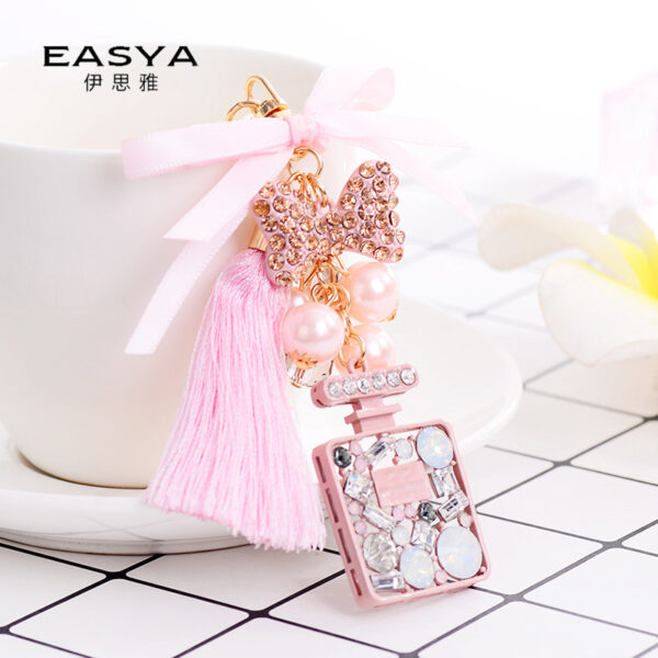 Wholesale Bow Ice Silk Tassel Perfume Bottle Zinc Alloy Keychain