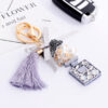 Wholesale Bow Ice Silk Tassel Perfume Bottle Zinc Alloy Keychain