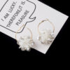 Wholesale Three-dimensional Flower Pearl Alloy Earrings