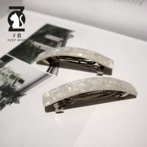 White. / Acetic acid