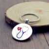 13219062274_1618818564 Wholesale Zinc Alloy Syringe Stethoscope Time Gemstone Keychain