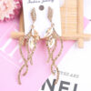 Wholesale Rhinestone Steel Needle Tassel Hollow Symmetry Earrings