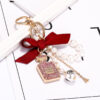 Wholesale Butterfly Pearl Zinc Alloy Keychains