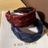 Wholesale Fabric Wide-brimmed Solid Color Cross Flower Headband