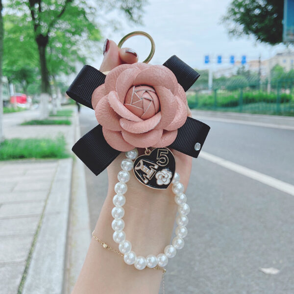 Wholesale PU Bow Camellia Keychain