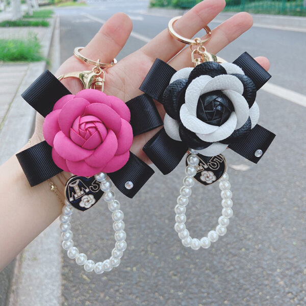 Wholesale PU Bow Camellia Keychain