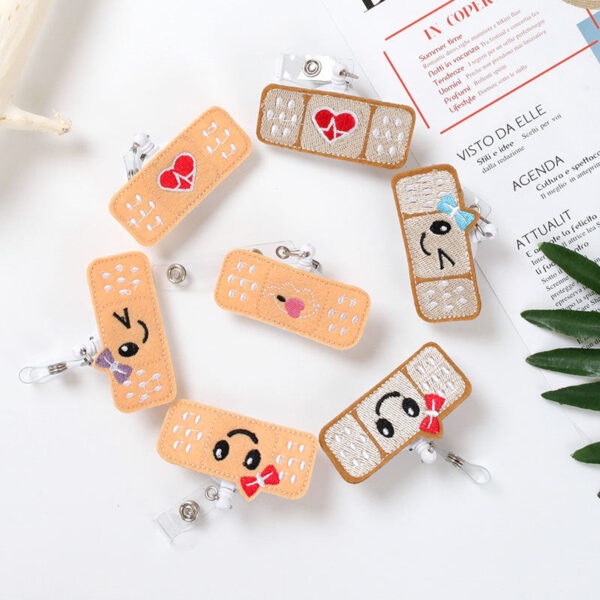 Wholesale Badge Reels Fabric Smiley Face Retractable Keychain