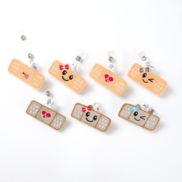 Wholesale Badge Reels Fabric Smiley Face Retractable Keychain