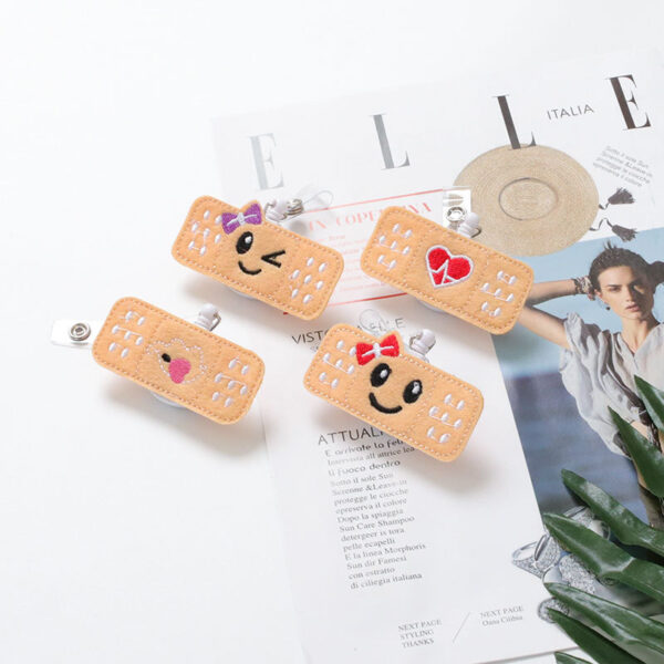 Wholesale Badge Reels Fabric Smiley Face Retractable Keychain