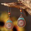 17057988359_221468121-1 Wholesale Bohemian Hollowed-out Drops Alloy Earrings
