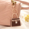 Wholesale Creative Leather Bags with Metal Keychains