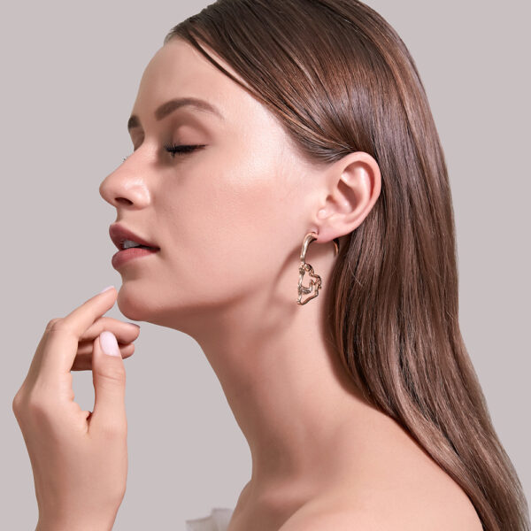 Wholesale Hollow Piercing Human Face Punk Style Earrings