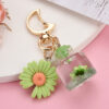 18470641431_707145485 Wholesale Moon Buckle Small Chrysanthemum Oil Quicksand Acrylic Keychains