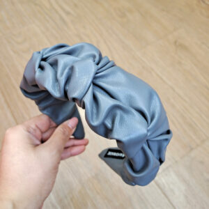 Gray leather flower brace