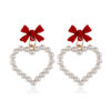 Wholesale Pearl Hollow Heart Shaped Pendant Bow Alloy Earrings