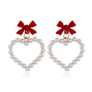 21888200691_179319909 Wholesale Pearl Hollow Heart Shaped Pendant Bow Alloy Earrings
