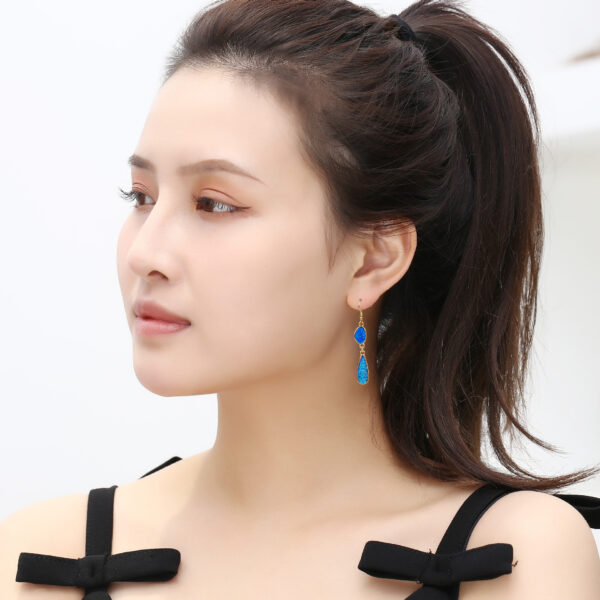 Wholesale Drops Resin Teeth Alloy Earrings