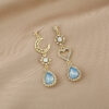 Wholesale 925 Silver Needle Diamond Hollow Heart Earrings Blue Drop Diamond Alloy Earrings