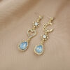 Wholesale 925 Silver Needle Diamond Hollow Heart Earrings Blue Drop Diamond Alloy Earrings