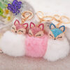 2520437208_949518863 Wholesale Diamond Fox Head Rabbit Hair Hairball Zinc Alloy Keychains