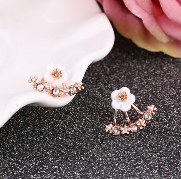 Wholesale small daisy flower rear hanging alloy earrings