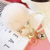 Wholesale Pearl Chain Plush 8cm Fur Ball Keychain