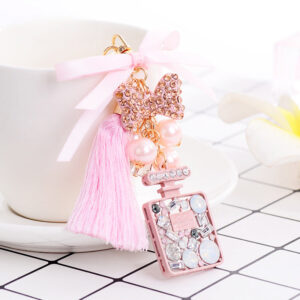 Wholesale Bow Ice Silk Tassel Perfume Bottle Zinc Alloy Keychain