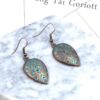 8989505418_1090711088 Wholesale Distressed Love Shape Alloy Pendant Hook Earrings