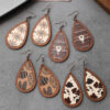 89ba74106e59458b24c6322beabeae03 Wholesale Western Style Cow Head Retro Aztec Pattern Cow Pattern Leather Wood Chip Earrings