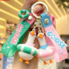 8e78c8c13d614efc0cc1be118d7b4dbf Wholesale PVC Cute Doll Goose Cartoon Keychain