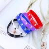 9093554102_1383311091 Wholesale Skull Movement Mixed Color Silicone Bracelet