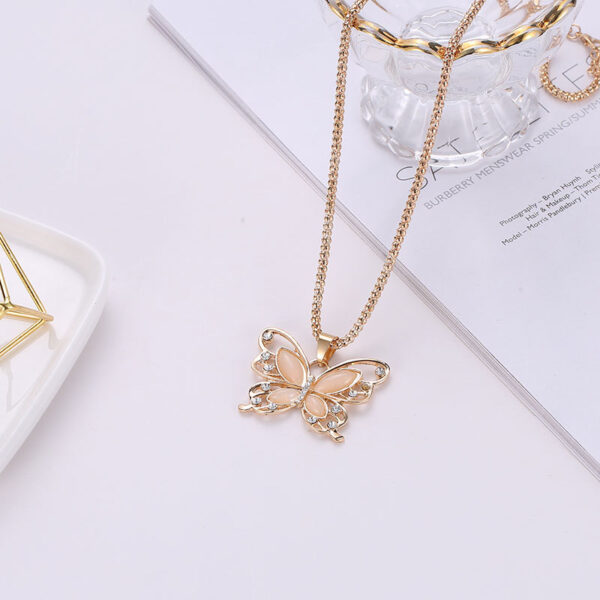 Wholesale Cat's Eye Stone Hollowed Out Butterfly Alloy Necklaces