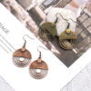 Wholesale Geometric Hollow Oval Alloy Pendant Earrings