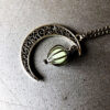 Wholesale Alloy Hollow Moon Heart Birdcage Luminous Beads Pendant Necklace