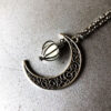 Wholesale Alloy Hollow Moon Heart Birdcage Luminous Beads Pendant Necklace