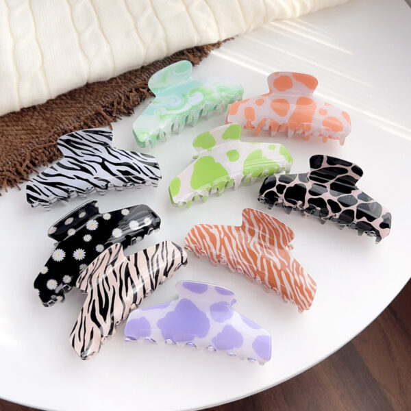 O1CN0101q8IK25t4MPsQqZp_2208039847583-0-cib Wholesale Color Zebra PVC Hair Clips