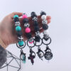 Wholesale Cartoon Bull Head Aztec Cross Silicone Beaded Wrist Keychain