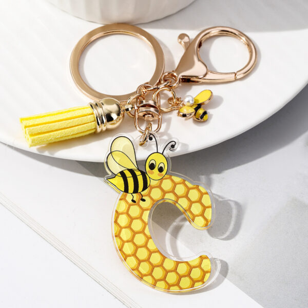 Wholesale Bee Honeycomb Acrylic English Letter Tassel Bee Enamel Keychain