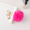 Wholesale of Cute Diamond Inlaid Angel Fur Ball Metal Keychains