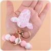 Wholesale Silicone Beads Cartoon Western Style Bull Head Wooden Sign Pendant Bracelet Keychains