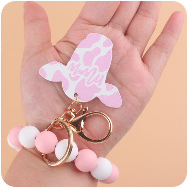 Wholesale Silicone Beads Cartoon Western Style Bull Head Wooden Sign Pendant Bracelet Keychains
