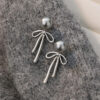 Wholesale Vintage Pearl Bow Metal Stud Earrings