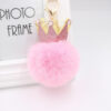 O1CN011WRnPF1X3aaokAqfv_2038122868-0-cib-3 Wholesale 3D Crown Pom Pom Keychain