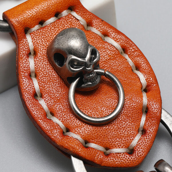 O1CN011YA8DR23CLufD9vnS_954827219-0-cib Wholesale Alloy Wings Leather Keychain