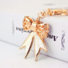 O1CN011hTScA1anL6TbYnVl_2208142583374-0-cib Wholesale Alloy Rhinestone Bow Keychain