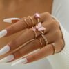 Wholesale Alloy Pink Butterfly Diamond Heart Hollow Nine Pieces Ring Set