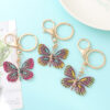 O1CN012Kat6O2Id7OnYKgUL_2102199308-0-cib Wholesale Butterfly Diamond Inlaid Alloy Keychains